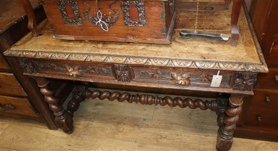 A late 19th century Flemish carved oak side table W.114cm